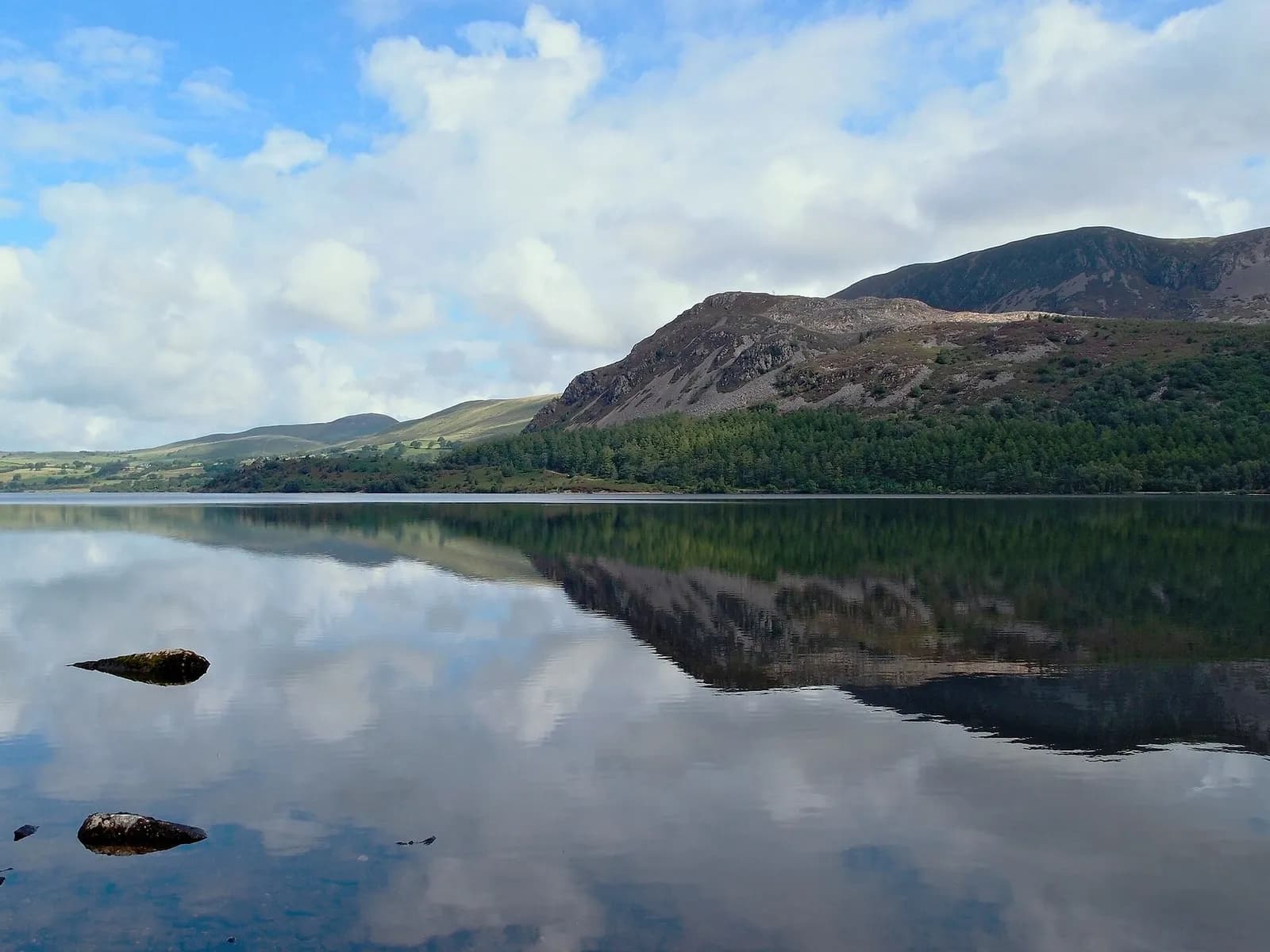 Still Ennerdale Water reflecting Bowness Knott and the surrounding fells