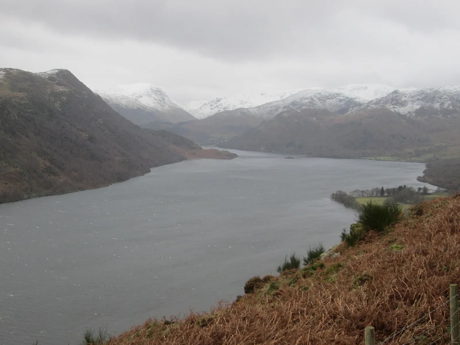 Ullswater from Gowbarrow Fell with snow on the Helvellyn fells beyond