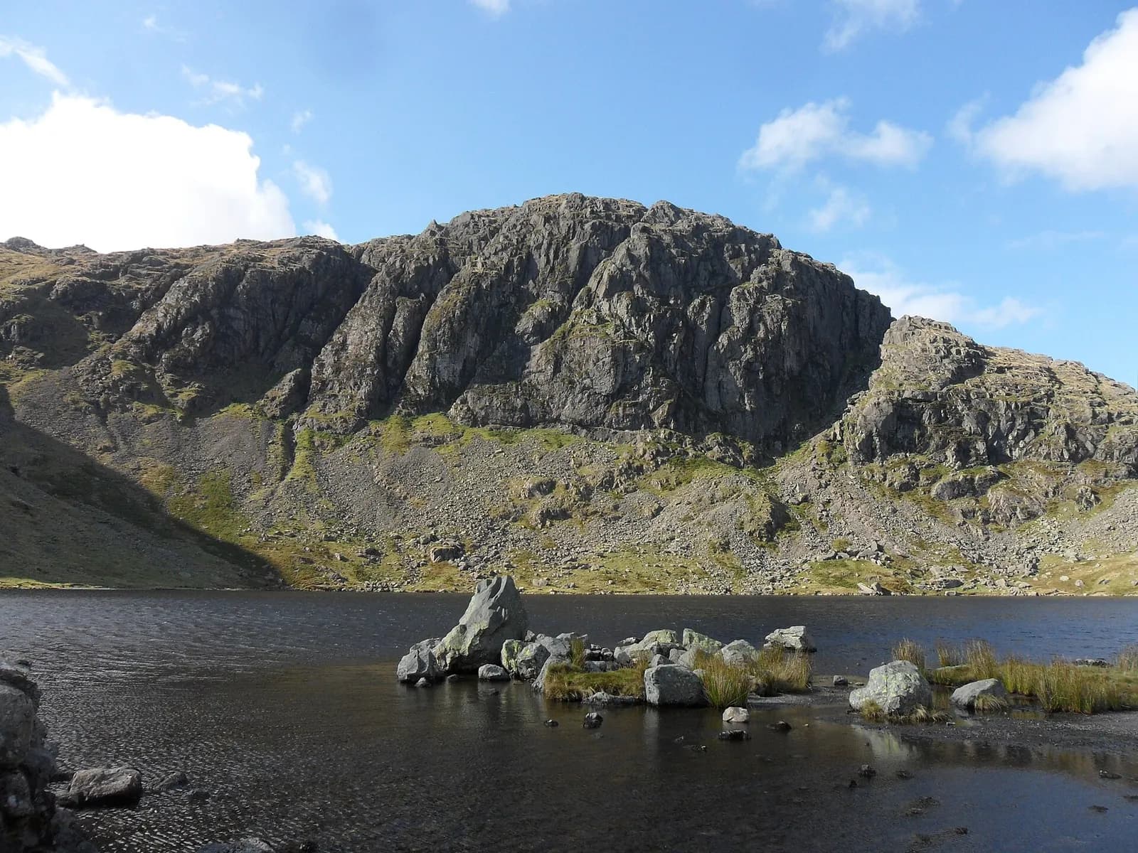 Stickle Tarn with the crags of Pavey Ark rising behind