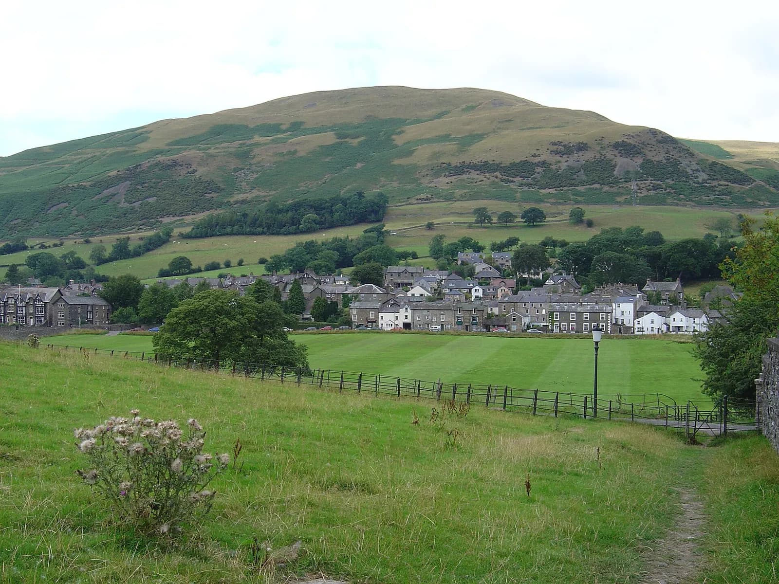 Sedbergh's grey stone houses beneath the green slopes of the Howgill Fells