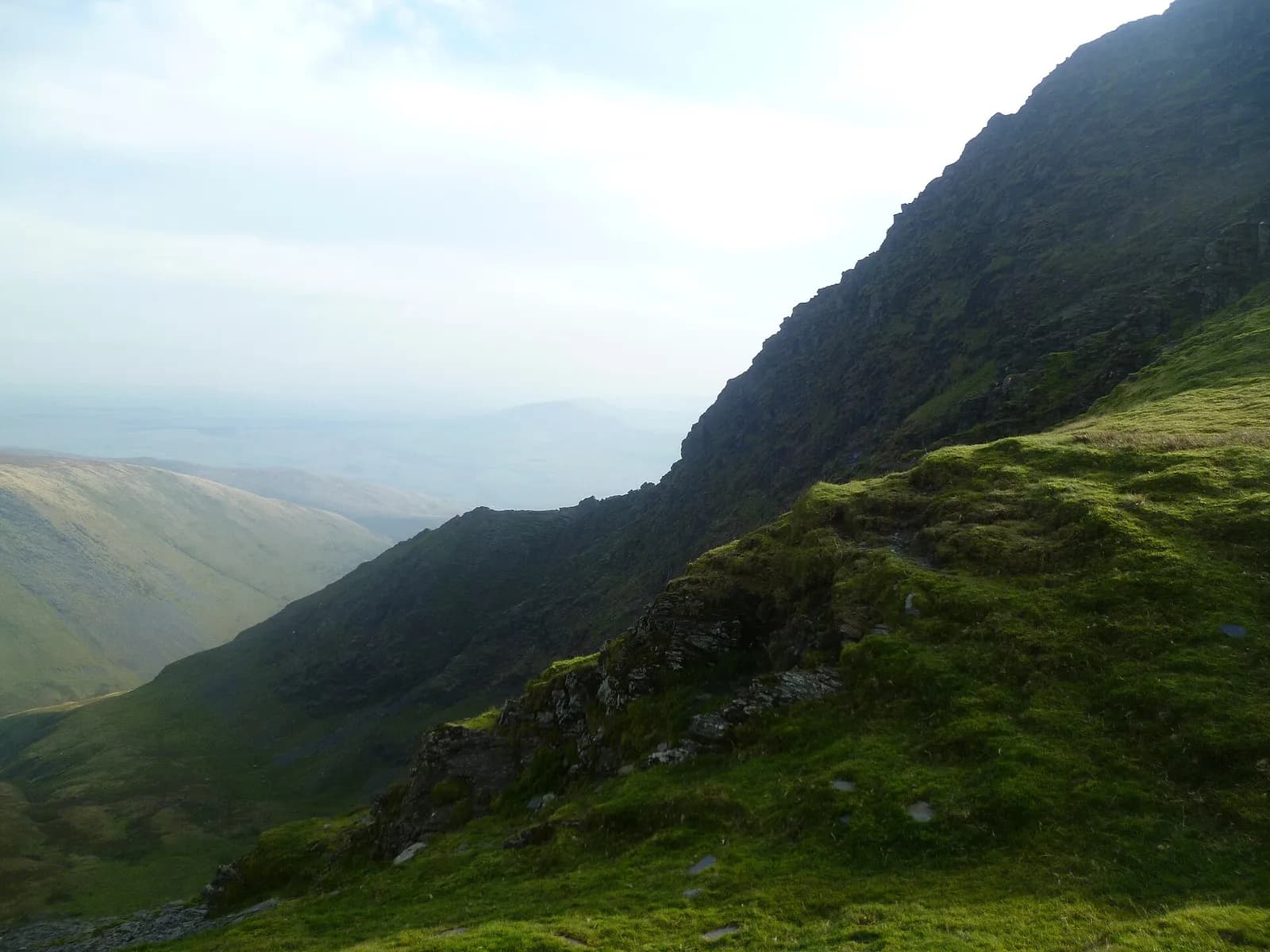The rocky crest of Sharp Edge rising towards Blencathra