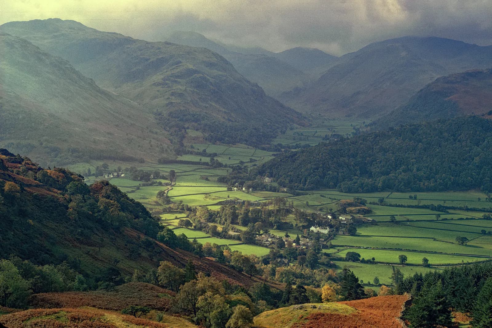 Rosthwaite and the green fields of Borrowdale seen from the path to Watendlath