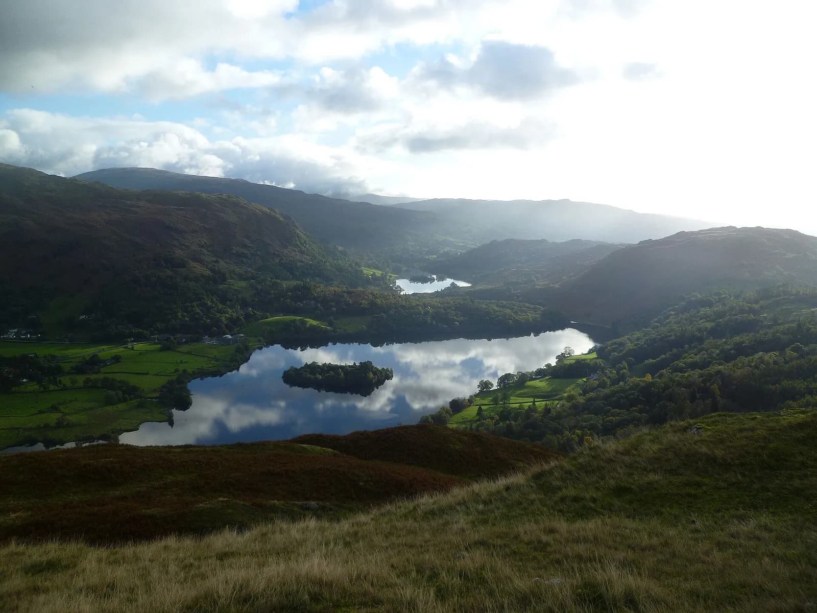 Grasmere and its island seen from the slopes of Silver How
