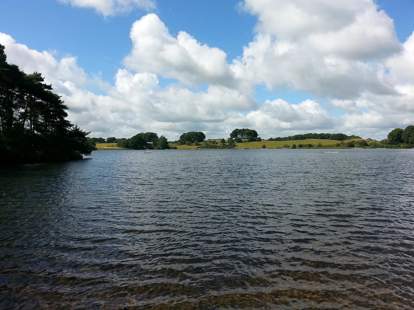 Talkin Tarn under big summer clouds
